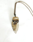 Flint arrowhead necklace for men on antique bronze chain – natural flint stone, detailed artisan wire wrapping, earthy masculine style.