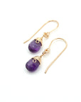 Angled look at amethyst drop earrings, artisan wire wrapping in 14k gold filled, February birthstone