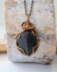 Detailed look at raw black tourmaline necklace on antique bronze chain, handcrafted crystal pendant by Designs by Nature Gems.