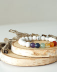 Right side view of chakra beaded stretch bracelet, natural white howlite and 7 chakra gemstone beads