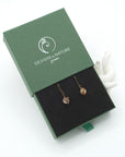 Citrine drop earrings presented in a branded gift box, ready for gifting, with antique bronze copper wire wrapping.