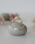 Back view of wire wrapped silver citrine ring showing artisan craftsmanship and metal wire detail - simple handmade crystal ring back side