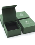 Branded Designs by Nature Gems jewelry box packaging for minimalist emerald necklace in gold vermeil.