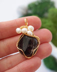 Garnet and freshwater pearl necklace pendant in hand for size reference, artisan birthstone jewelry gift for her