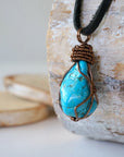 Handmade turquoise necklace for men antique copper wire wrap left side detail