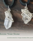 Two Herkimer diamond pendants for men showing natural variation in crystal size, shape, and handcrafted sterling silver wire wrapping.
