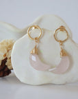 Detailed close-up of Lux Limited Edition Rose Quartz Moon Open Circle Stud Earrings on jewelry display, faceted natural rose quartz, 14k gold filled, handmade.