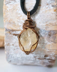 Back view of mens citrine pendant showing antique bronze copper wire wrapping detail - natural crystal handmade masculine jewelry craftsmanship back side