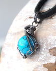 Mens turquoise necklace with 925 silver antiqued wire wrapping detail black leather cord