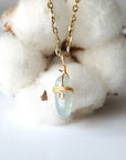 Minimalist aquamarine necklace, detailed front view, genuine polished aquamarine wrapped in warm gold finish over copper wire, March birthstone, Designs by Nature Gems