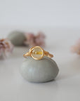 Front view of simple raw citrine ring showing natural yellow crystal wire wrapped in sterling silver gold or copper - handmade minimalist ring
