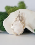 Back detail of silver wire wrapped moonstone and freshwater pearl pendant necklace, handcrafted gemstone jewelry