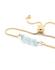 Natural aquamarine slider bracelet with raw blue aquamarine crystals on gold plated brass adjustable chain - March birthstone jewelry for women