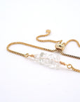 Natural clear quartz slider bracelet with raw crystal quartz stones on gold plated brass adjustable chain - April alternative birthstone jewelry for women