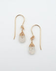 Angled look at rainbow moonstone drop earrings, artisan wire wrapping in 14k gold filled, June birthstone