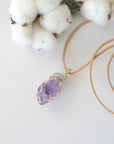Raw amethyst necklace for women — handmade 925 sterling silver wire wrapped pendant on genuine tan leather cord, February birthstone, by Designs by Nature Gems