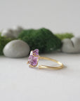 Left side detail of raw amethyst crystal ring in 14k gold vermeil claw setting, adjustable women’s ring