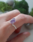 Adjustable raw amethyst ring in sterling silver, February birthstone crystal ring on model hand