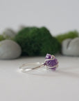 Right side detail of raw amethyst ring in sterling silver claw setting, natural crystal birthstone ring