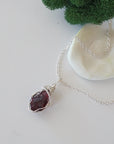 Raw garnet necklace with 925 sterling silver wire wrapped pendant on silver chain
