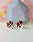 Back view of raw ruby prong stud earrings showing 925 sterling silver posts and butterfly closure — natural crystal earrings quality detail