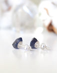 Back view of raw sapphire stud earrings showing the 925 sterling silver posts and earring backs