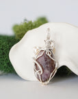 Back detail of silver wire wrapped ruby and freshwater pearl pendant necklace, handcrafted gemstone jewelry