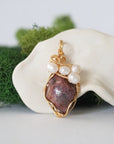 Detailed front angle of ruby and freshwater pearl pendant, gold wire wrapped, handcrafted gemstone jewelry