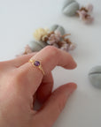 Simple amethyst birthstone ring in gold finish on model hand, minimalist wire wrapped 6mm amethyst bead