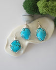 Three simple raw turquoise necklace variations showing natural stone color differences, minimalist wire wrapped