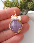 Amethyst and freshwater pearl necklace pendant in hand for size reference, artisan birthstone jewelry gift for her