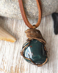 Detailed front view of natural bloodstone necklace, handcrafted crystal pendant by Designs by Nature Gems.