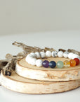 Right side view of chakra beaded stretch bracelet, natural white howlite and 7 chakra gemstone beads