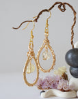 Back view of citrine drop earrings showing gold plated ear wire and wire wrap detail - handmade natural crystal dangle earrings back side