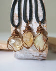 Three natural citrine crystals showing variation in mens necklace pendants - different sizes shapes colors antique bronze wire wrapped unique one of a kind masculine jewelry