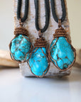 Natural turquoise necklace men showing 3 unique stone variations on leather