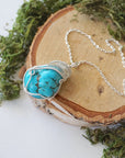 Raw turquoise necklace with silver wire wrap on silver plated brass chain