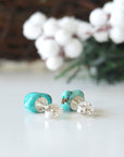 Back view of turquoise stud earrings showing sterling silver backs and secure closure system - hypoallergenic posts