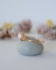 Side view of a 14k gold filled pearl wire wrapped ring