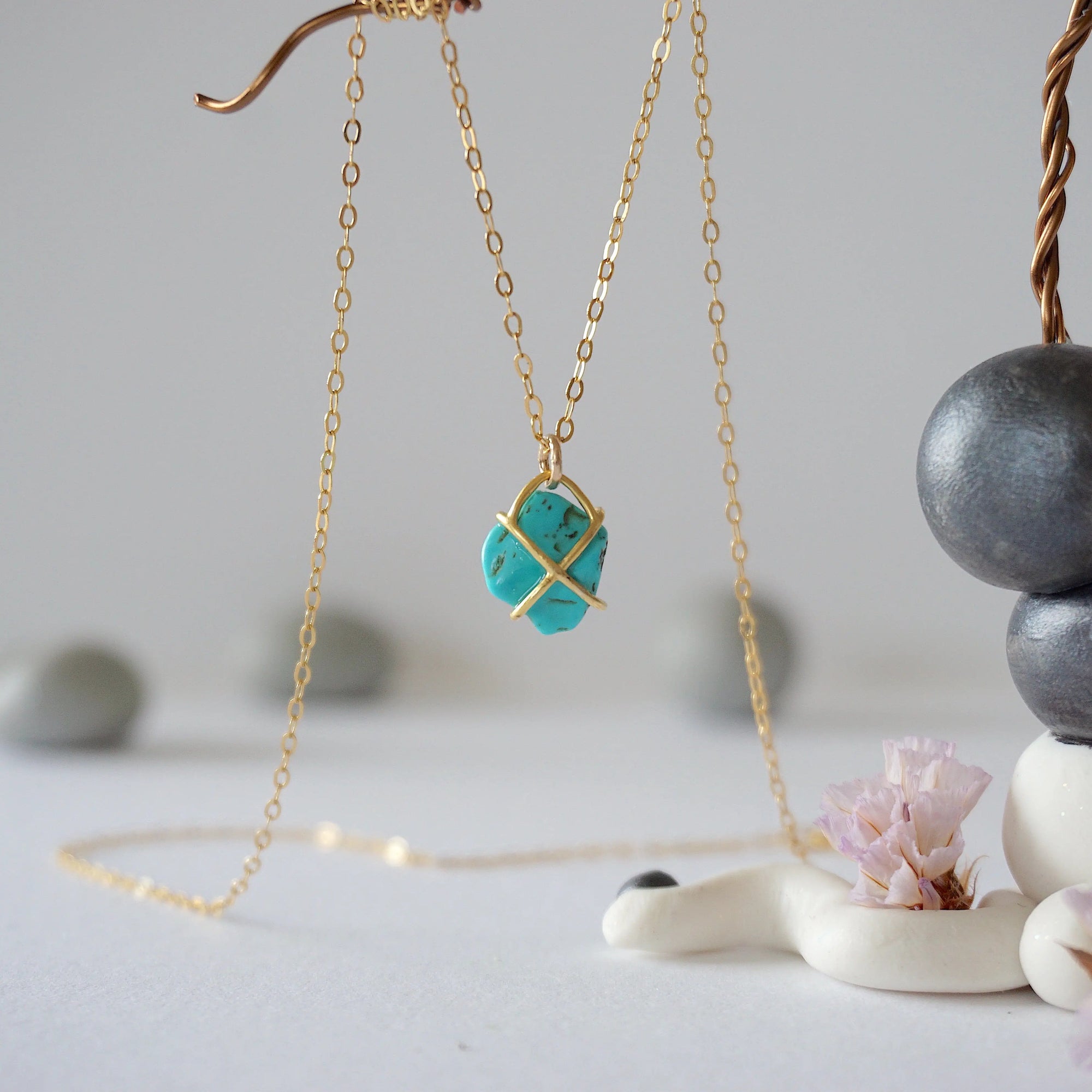 Back view of 14k gold vermeil turquoise necklace showing gold claw prong setting