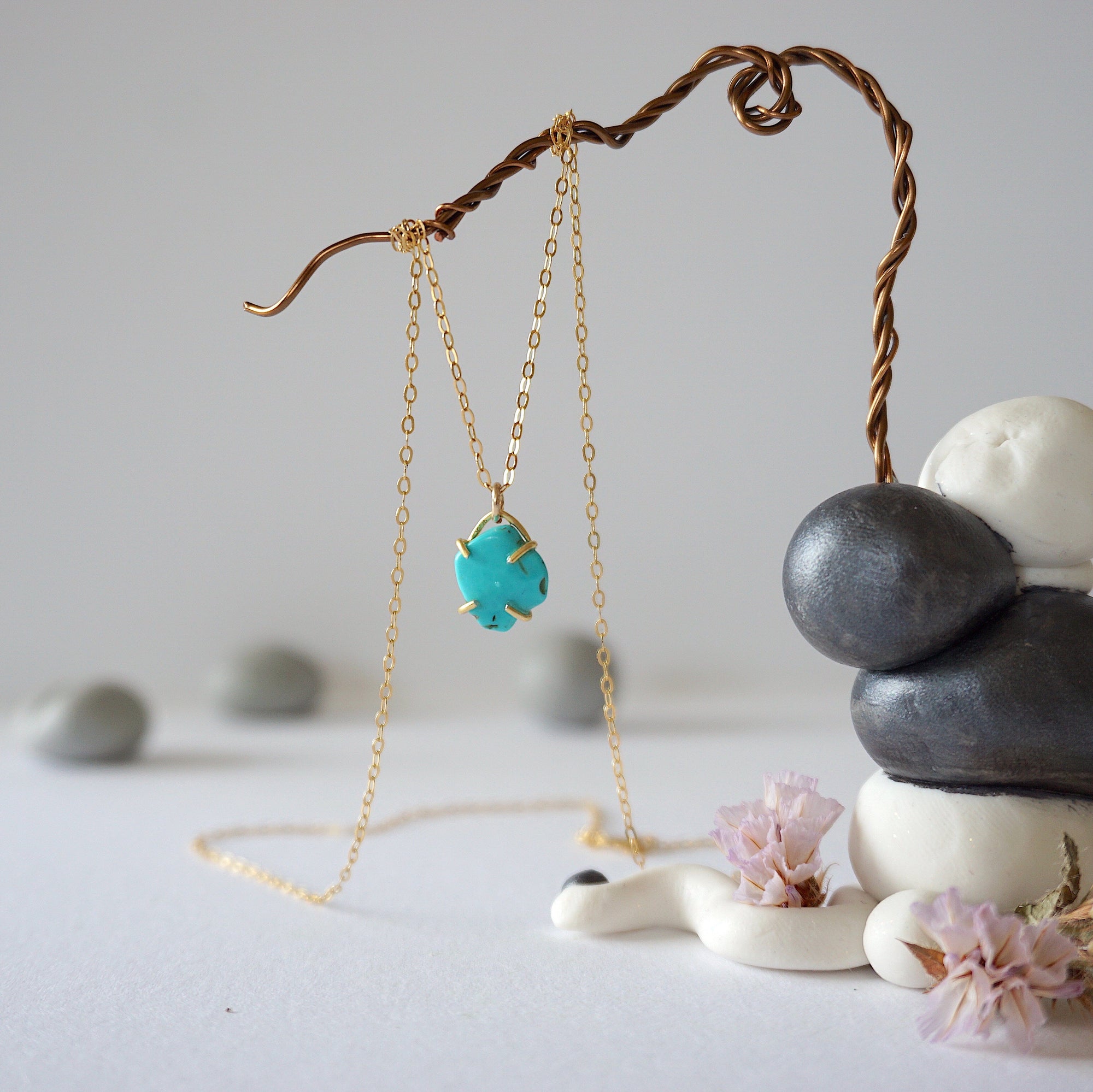 14k gold vermeil turquoise pendant necklace hanging on display showing full length