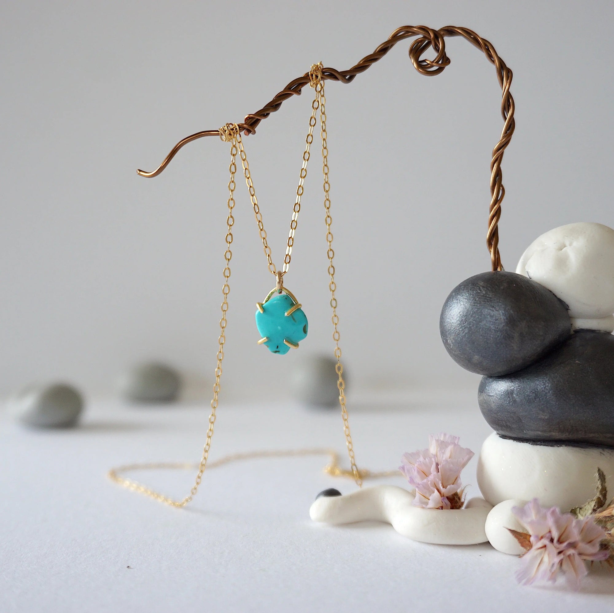 14k gold vermeil turquoise pendant necklace hanging on display showing full length