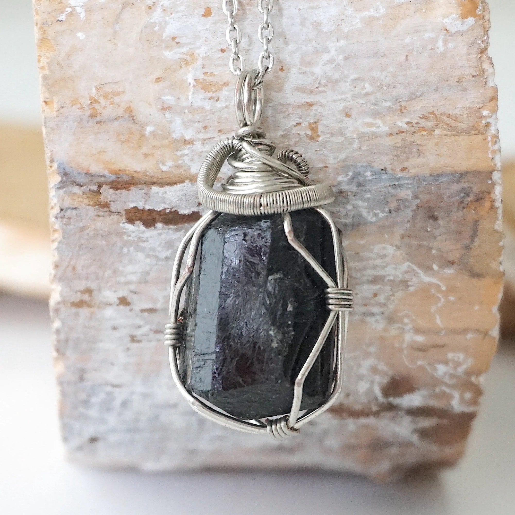 Handcrafted raw black tourmaline necklace for men, front view – artisan dark silver copper wire wrapping, natural October birthstone pendant.