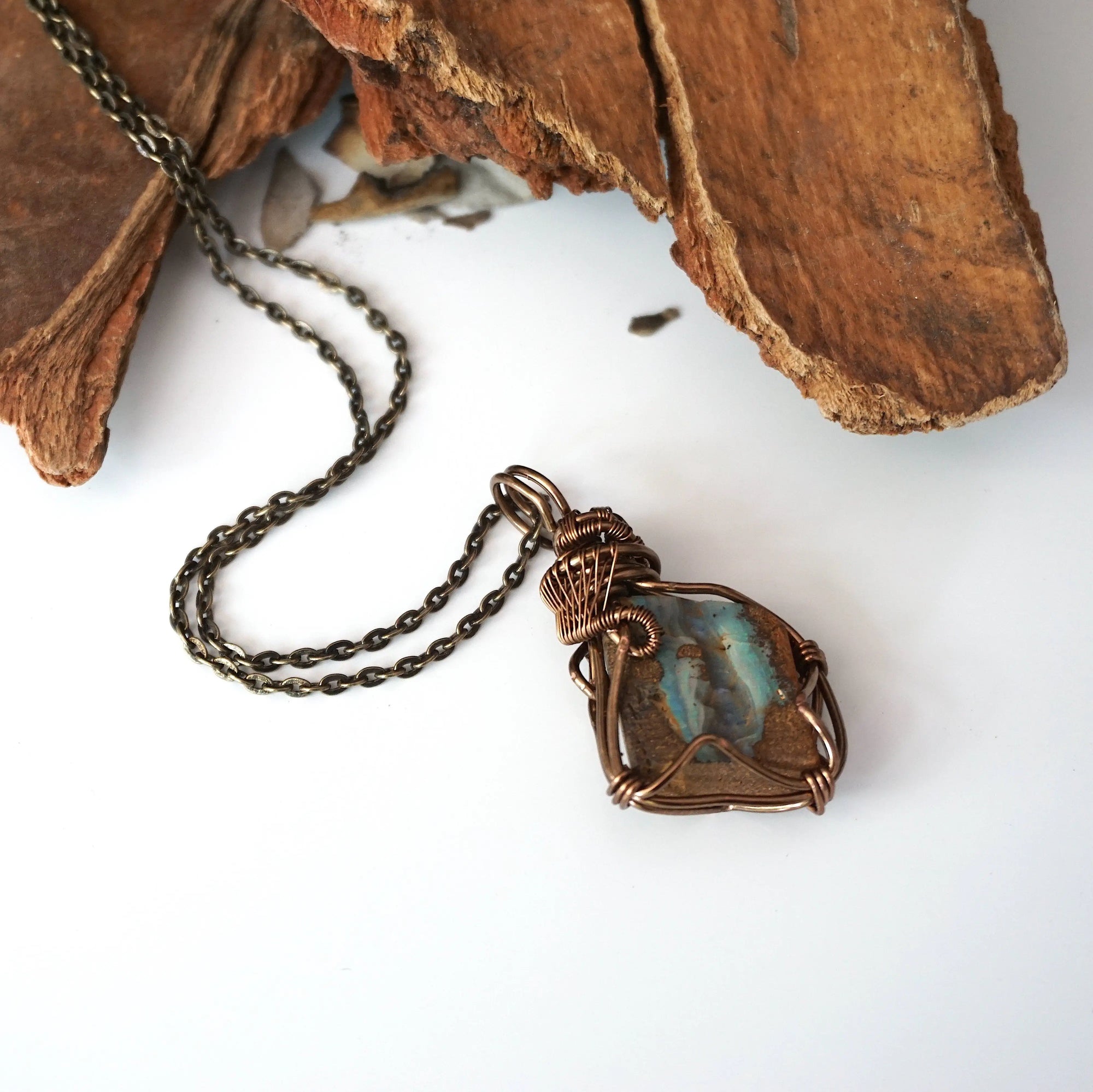 ustralian boulder opal pendant for men on antique bronze chain – handcrafted, artisan wire wrapped natural crystal.