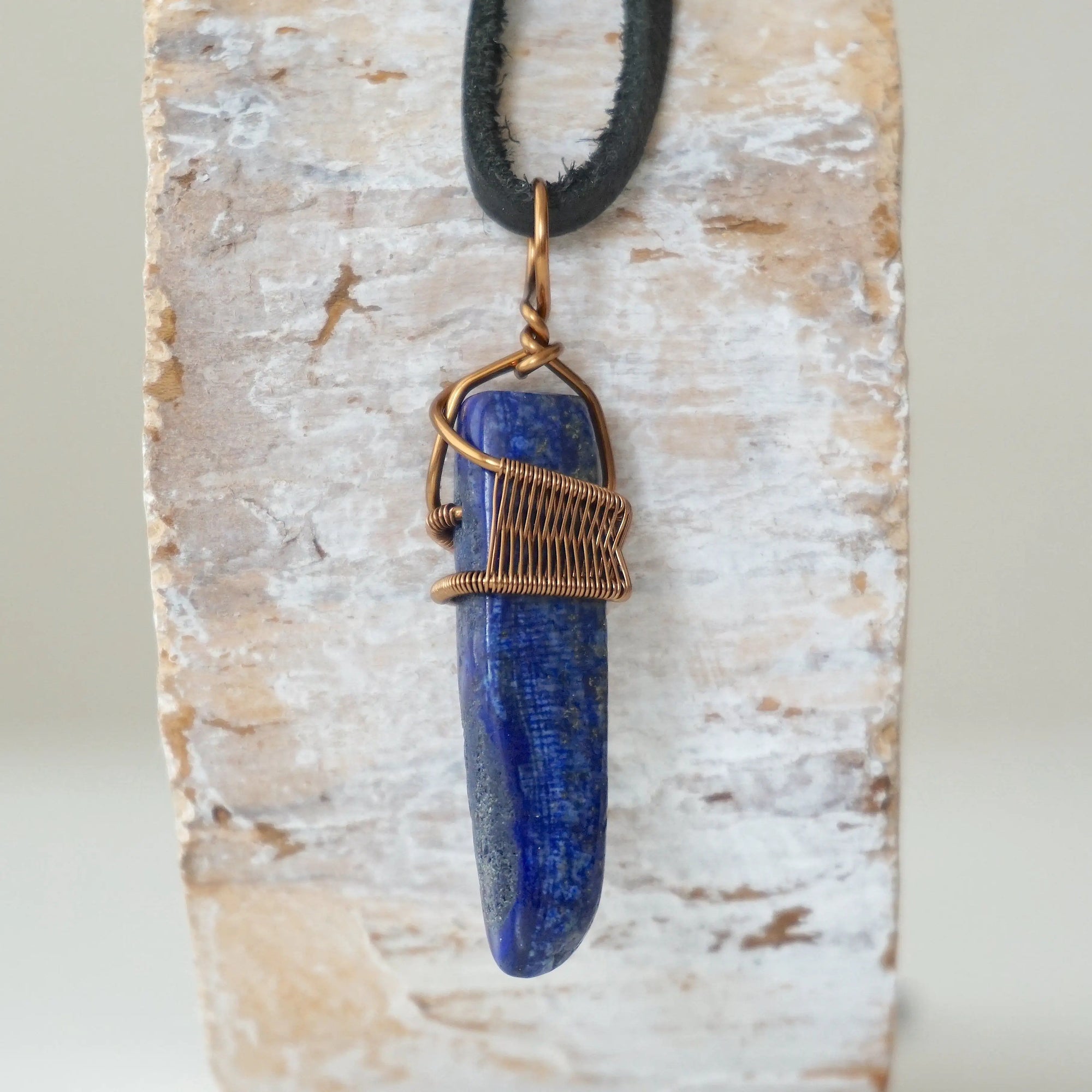 Handcrafted lapis lazuli point necklace for men, front view – artisan antique bronze copper wire wrapping, alternative September birthstone, natural crystal pendant.