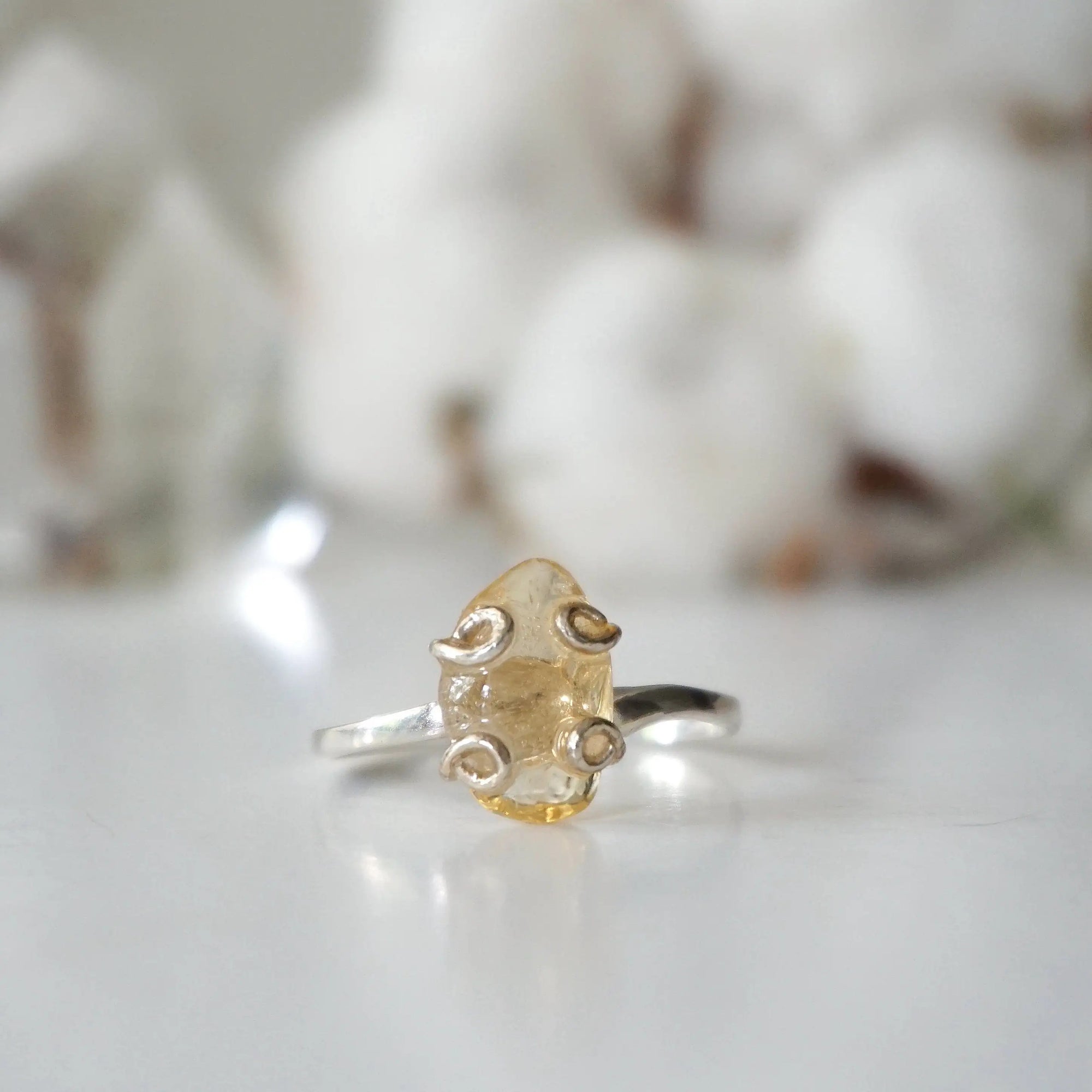 Adjustable citrine ring sterling silver 925 flat lay closeup - natural crystal wire wrapped handmade ring for women November birthstone detail view