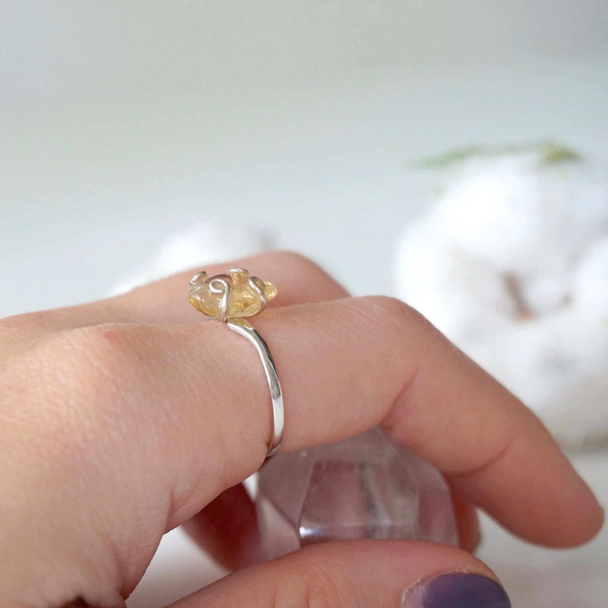 Adjustable citrine ring sterling silver 925 on woman's hand different angle - natural crystal wire wrapped ring for women November birthstone lifestyle view