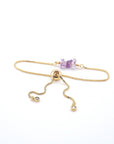Gold plated brass slider closure on adjustable amethyst bracelet showing easy fit mechanism - handcrafted birthstone jewelry