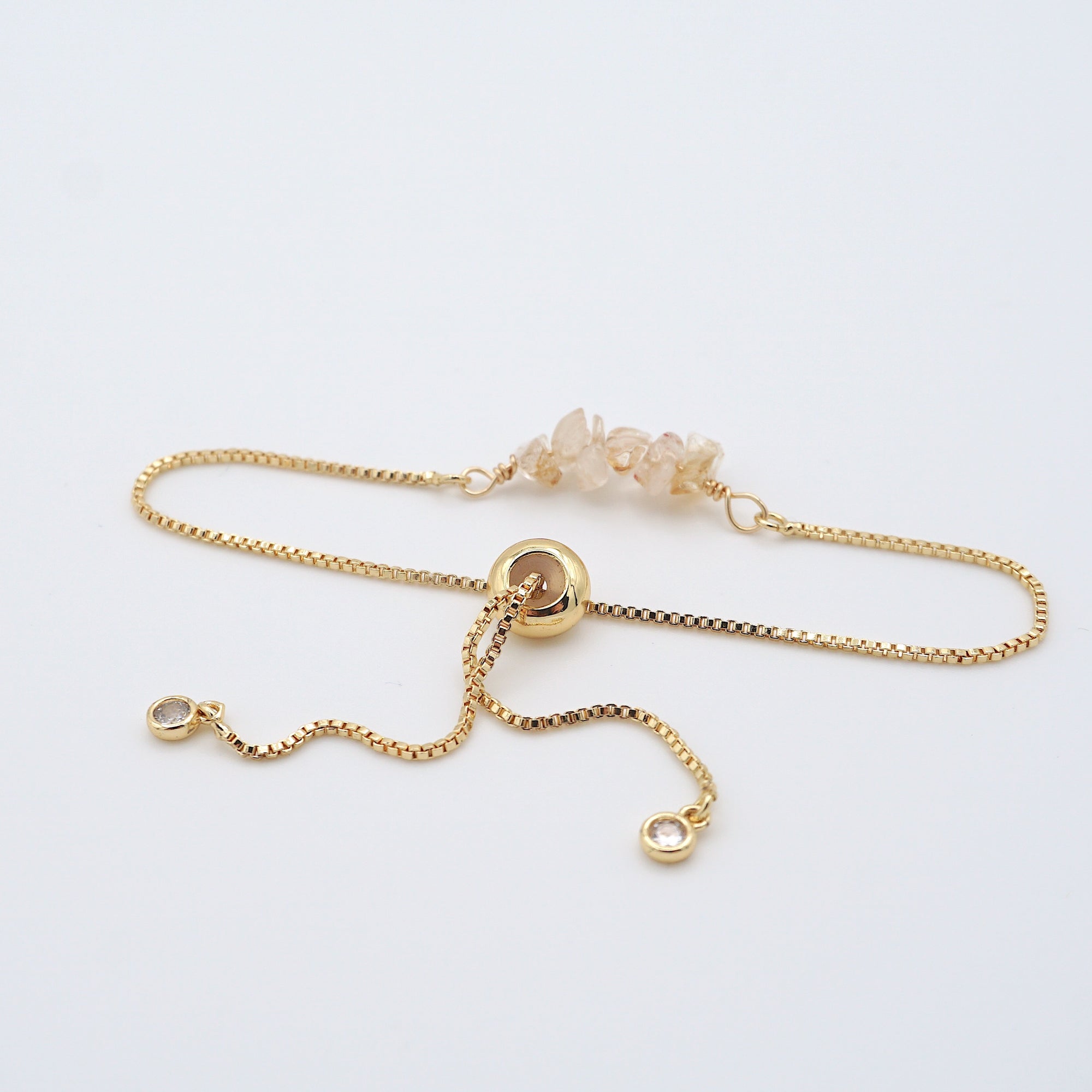 Gold plated brass slider closure on adjustable citrine bracelet showing easy fit mechanism - handcrafted birthstone jewelry