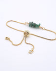 Gold plated brass slider closure on adjustable emerald bracelet showing easy fit mechanism - handcrafted birthstone jewelry